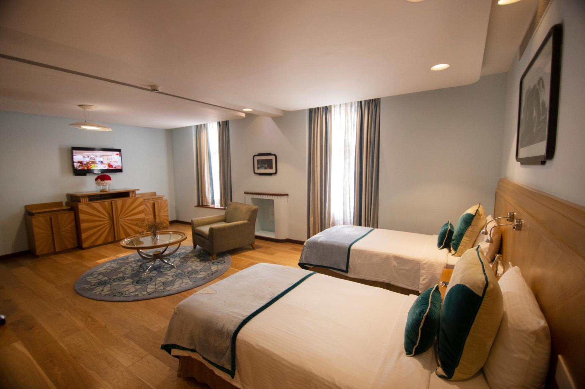 แอมบาสซาเดอร์ - ไอเอชซีแอล ซีเล็คชั่น Hotel นิวเดลี ภายนอก รูปภาพ Deluxe Room