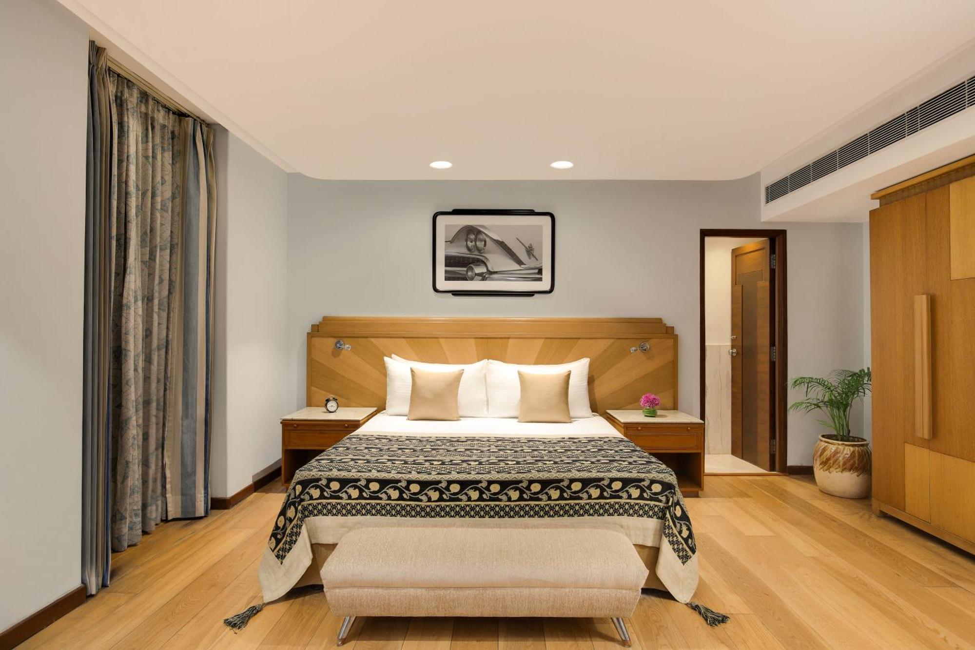 แอมบาสซาเดอร์ - ไอเอชซีแอล ซีเล็คชั่น Hotel นิวเดลี ภายนอก รูปภาพ A bedroom at the Taj Bengal