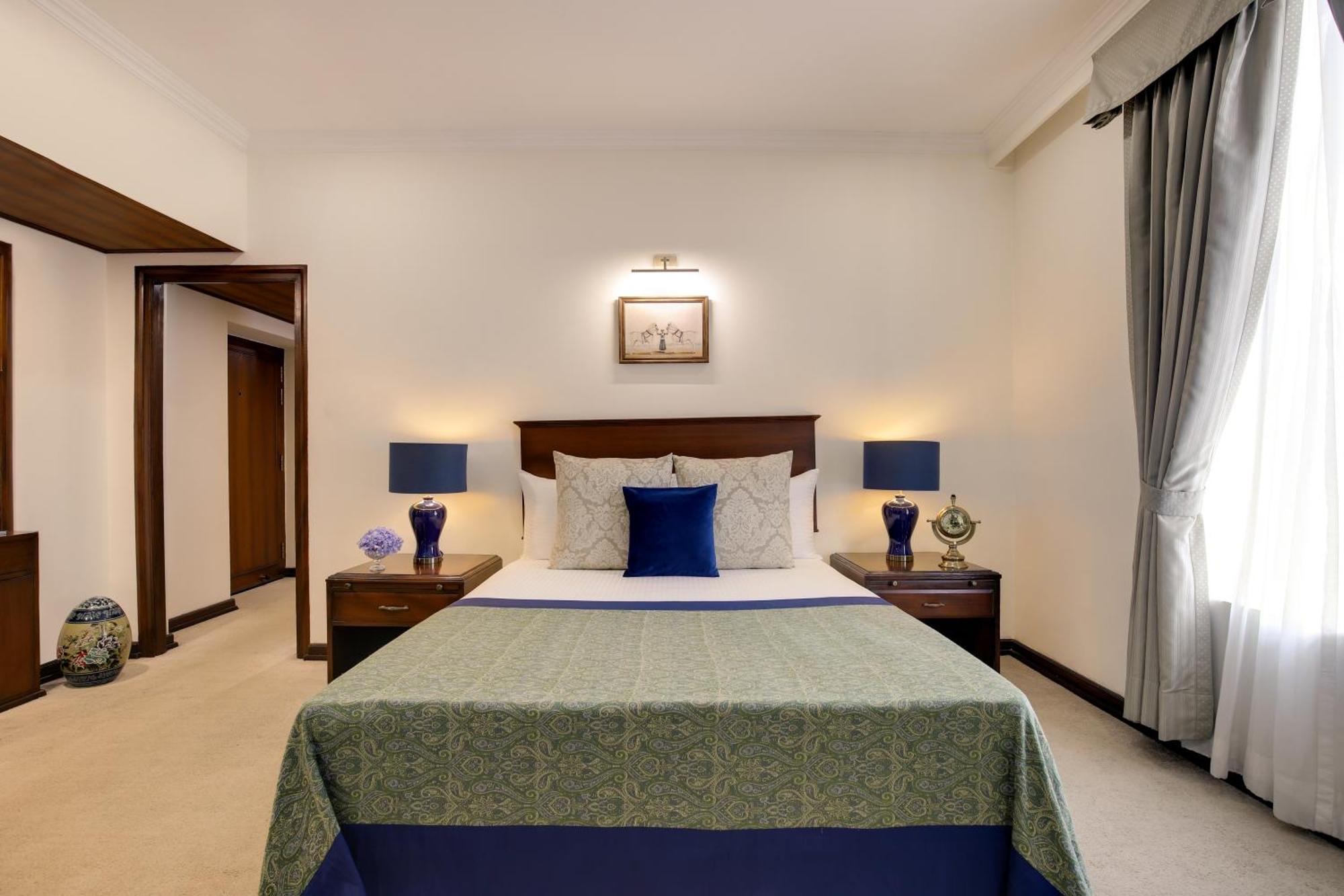 แอมบาสซาเดอร์ - ไอเอชซีแอล ซีเล็คชั่น Hotel นิวเดลี ภายนอก รูปภาพ A bedroom at the Taj Bengal