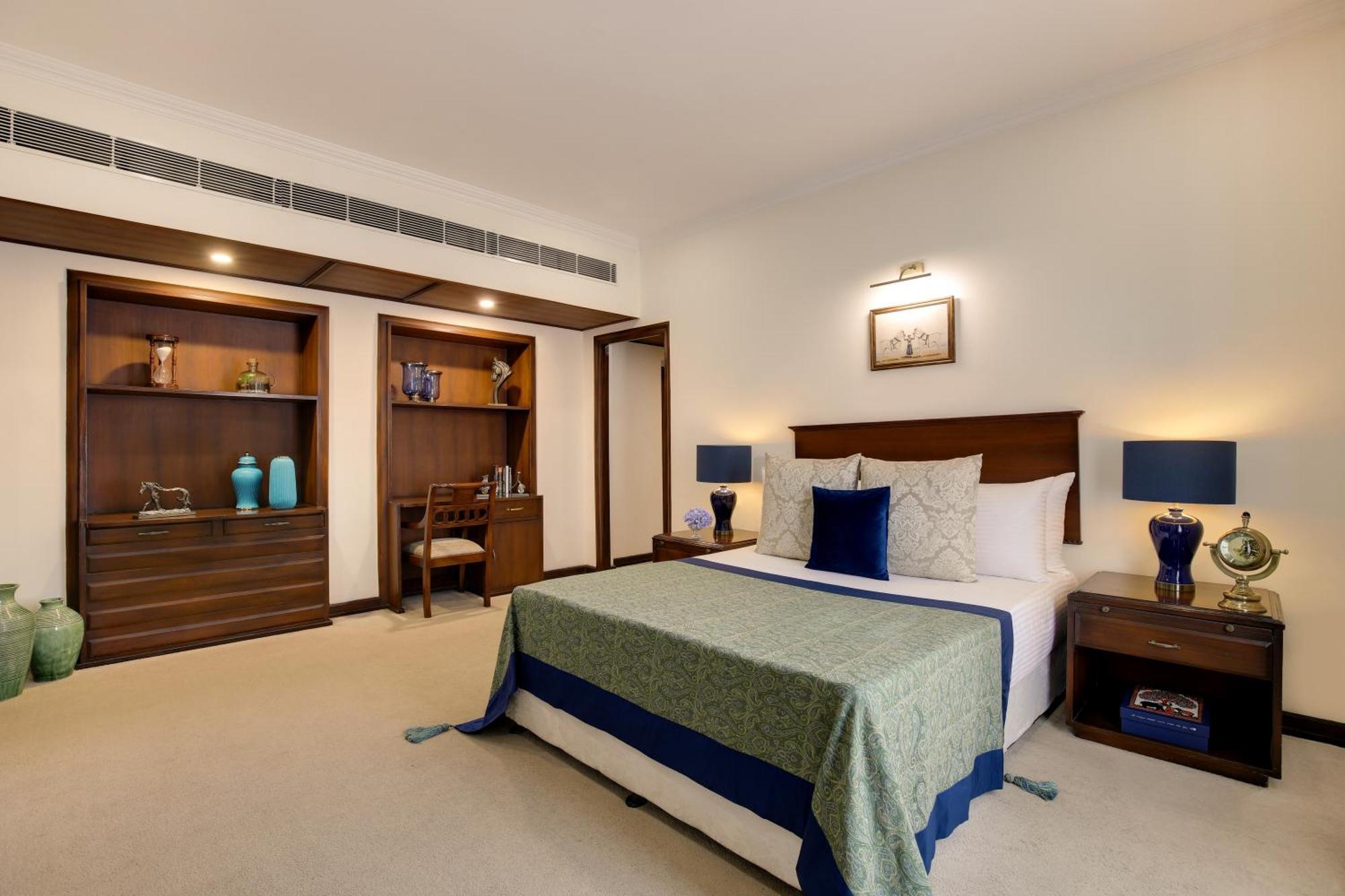 แอมบาสซาเดอร์ - ไอเอชซีแอล ซีเล็คชั่น Hotel นิวเดลี ภายนอก รูปภาพ A bedroom at the Taj Bengal
