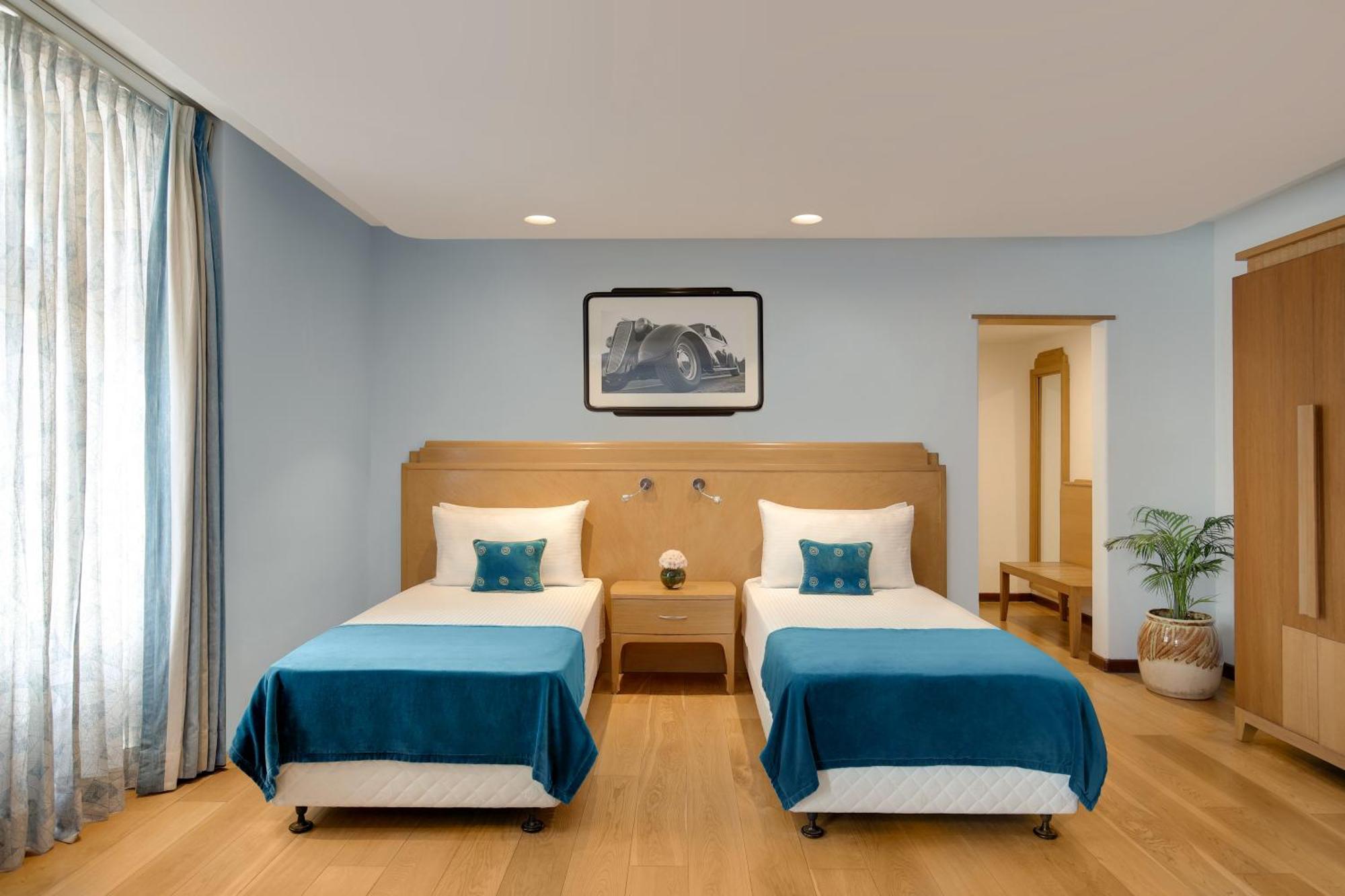 แอมบาสซาเดอร์ - ไอเอชซีแอล ซีเล็คชั่น Hotel นิวเดลี ภายนอก รูปภาพ A room at the hotel